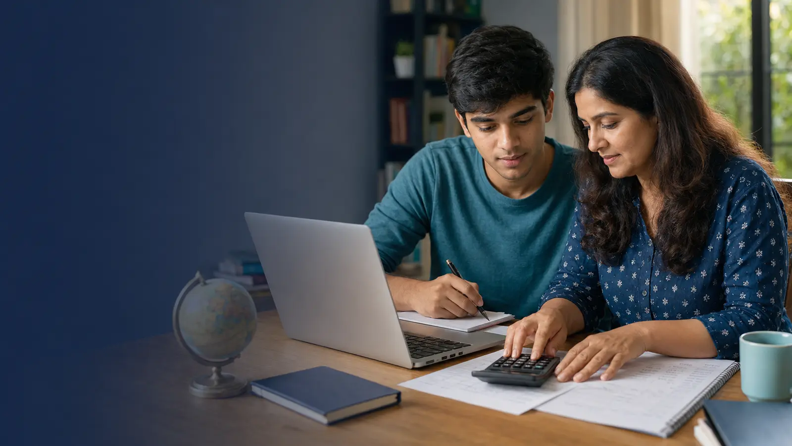 Indian student and parent planning the full cost of college and studying abroad